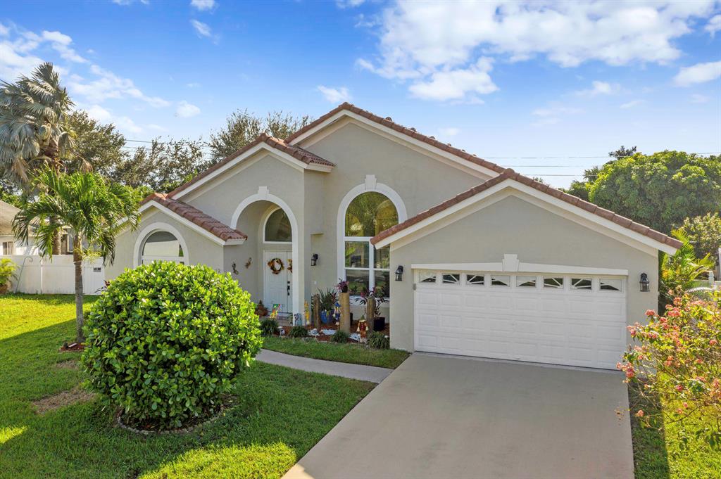 Tall Mediterranean Ranch home on a 1/4 acre. Vaulted ceilings & arched windows provide abundant light in the living spaces. Open kitchen features a breakfast area, wrap around counters, and a walk through butlers pantry to dining room. All new Stainless Appliances. Main bedroom includes a sitting room & sliding doors to the patio. Main bath has dual vanities, roman tub, walk in shower, & a private stall. All bedrooms have walk-in closets. Bonus room can easily convert to a 5th bedroom. Storm impact windows throughout. New screened patio enclosure & a pool w/attached Spa and southern exposure! Recently fenced spacious yard. Extended 25 foot garage for parking small watercraft or long vehicles & trailers. AC is 4 years old. LOW HOA is $224/year. Walking distance to nearby parks. Call Now!