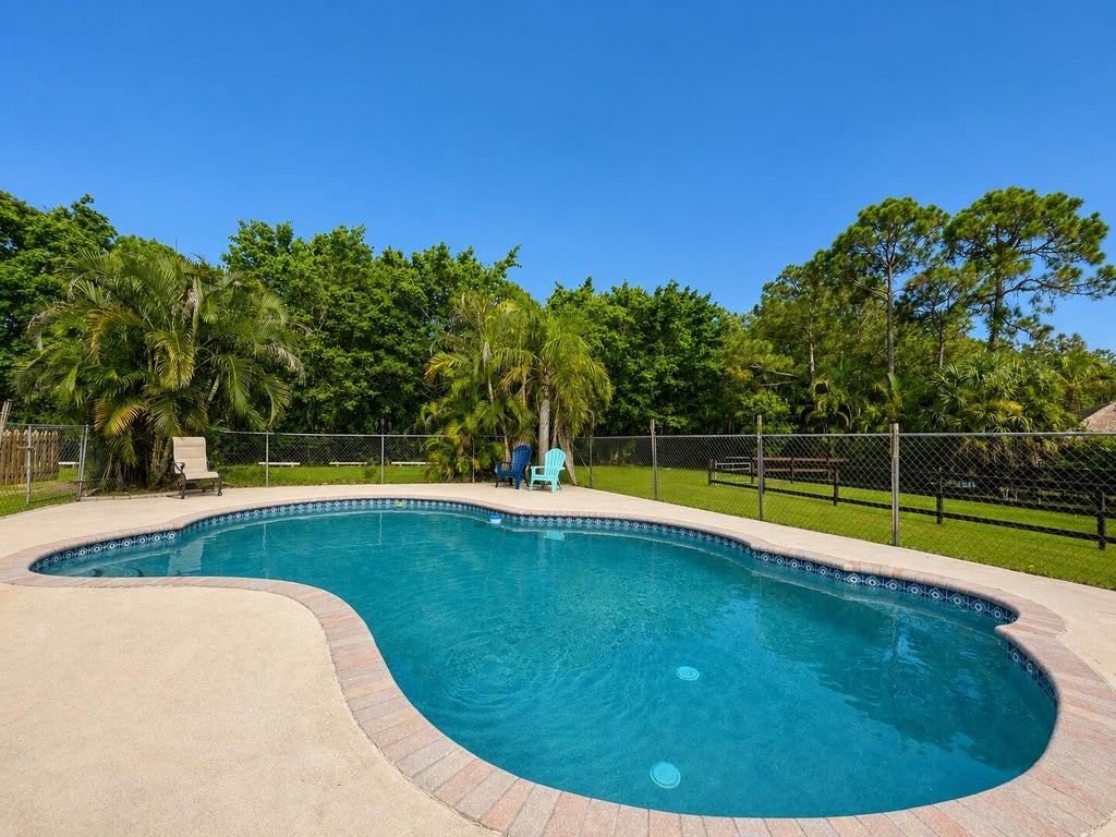 Photo of 12230 63RD Lane N, The Acreage, FL 33412 (MLS # B26067974)