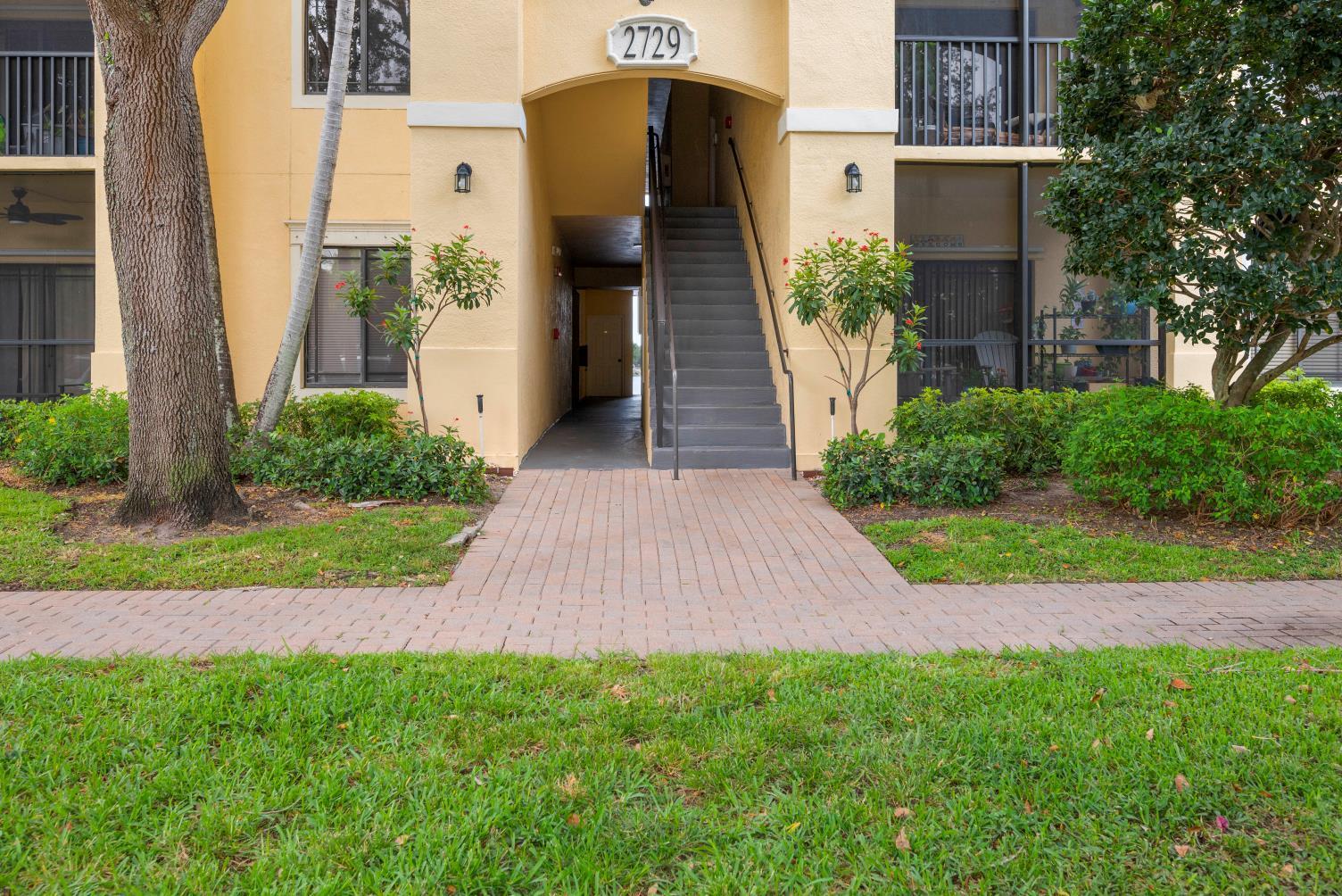 Enjoy morning coffee or an evening cocktail on your large screened in corner balcony overlooking the lake !!! This exquisite 3 bedroom renovated corner unit has all impact glass windows and impact slider all having water views. This unit with a spacious open floor plan includes new porcelain floor tiles, new kitchen with a large pantry cabinet and all stainless-steel appliances and new quartz kitchen countertops. A new high efficiency AC / filtration system was installed. Plenty of extra shelving for increased storage. New washer and dryer. San Matera is a resort -style gated community with many amenities including a swimming pool, hot tub, tennis and pickle ball courts, clubhouse, business center, sauna, steam room, billiard room, racquetball court and gym and walking distance to the