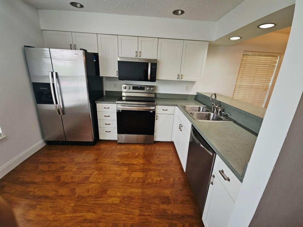 Photo of 5 Heather Trace Drive, Boynton Beach, FL 33436 (MLS # B26015812)