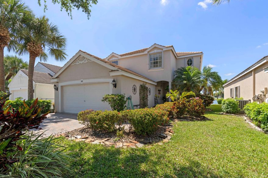 Welcome to this spacious and beautifully updated waterfront home located in the desirable gated community of Victoria Grove. Over 3,000 sqft of living space, this two-story residence features 4 bedrooms, and 2.5 bathrooms.  Freshly painted interior with modern vinyl plank flooring throughout. The main level features a formal living room and a large front study (office, playroom or guest room flex space). Bright and expansive great room connected to the kitchen and dining area, creating an ideal open-concept.   Upstairs, all four bedrooms, including a large primary suite with dual walk-in closets and a beautifully upgraded bathrooms. Updated guest bath.   A/C system (2022), water heater (2019), impact sliders. Fully fenced yard on a gorgeous lake front property. This property is a stunner.