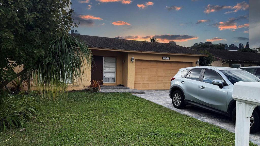 Photo of 9820 NW 24th St, Coral Springs, FL 33065 (MLS # F10540432)