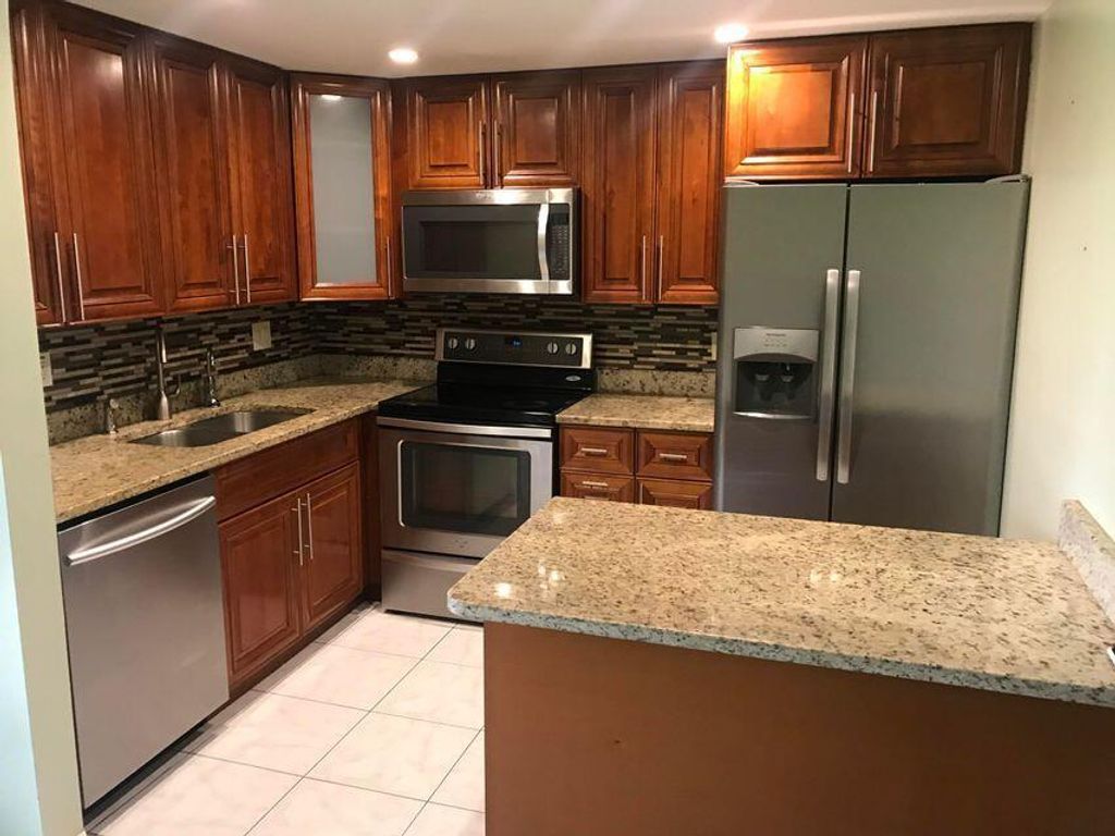 Photo of 4725 Oak Terrace Drive, Greenacres, FL 33463 (MLS # R11105186)