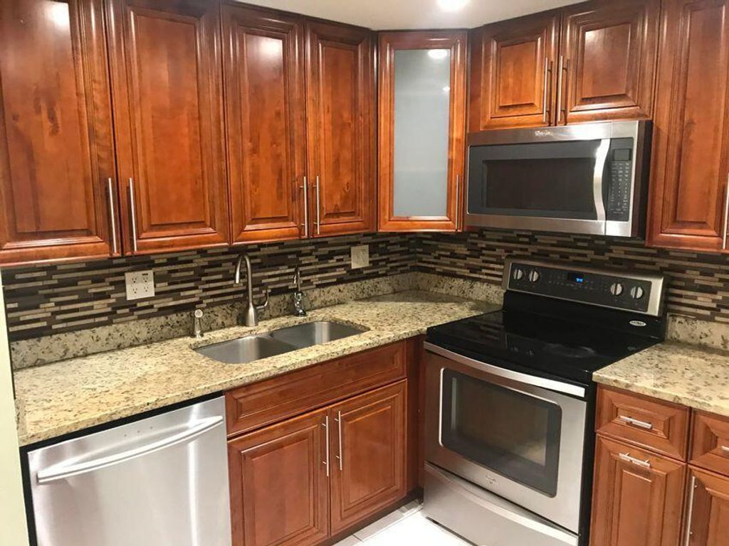 Photo of 4725 Oak Terrace Drive, Greenacres, FL 33463 (MLS # R11105186)