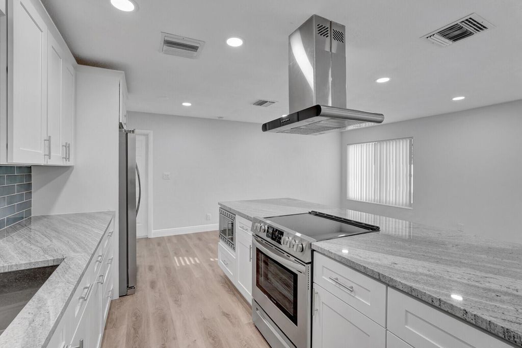 Photo of 904 Lighthouse Drive, North Palm Beach, FL 33408 (MLS # R10933722)