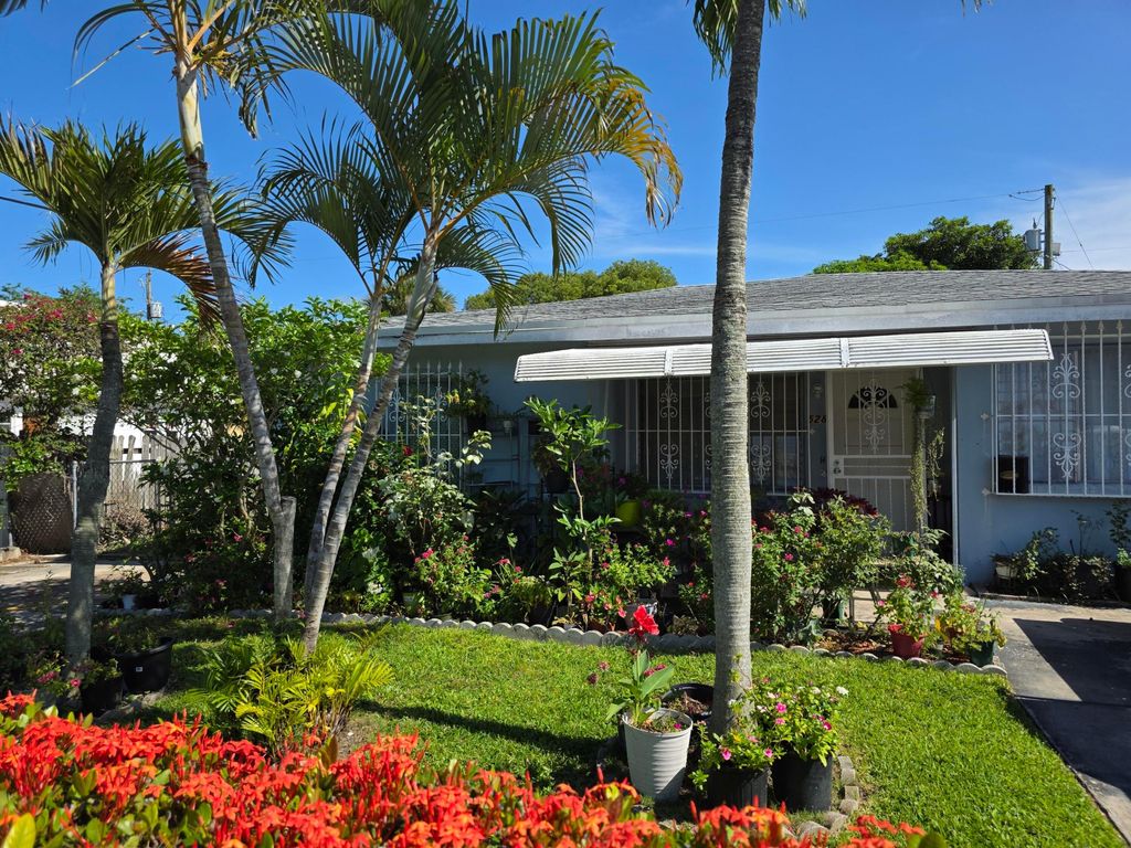 Photo of 528 49th Street, West Palm Beach, FL 33407 (MLS # B26041189)