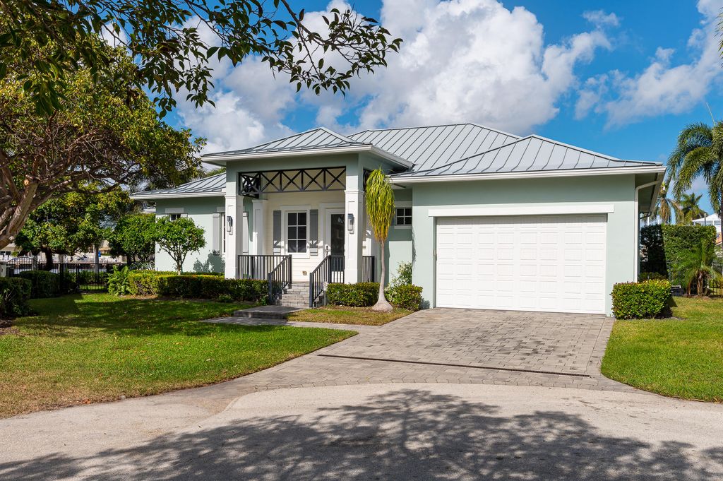 Photo of 36 Ixora Way, Ocean Ridge, FL 33435 (MLS # R10938008)