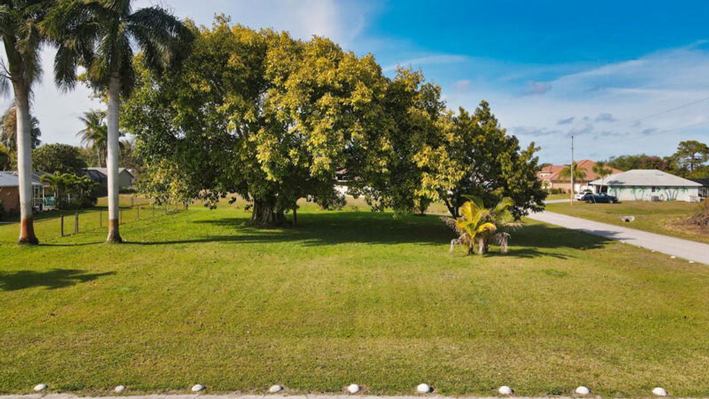 Photo of 4694 SW Athena Drive, Port Saint Lucie, FL 34953 (MLS # R10965887)