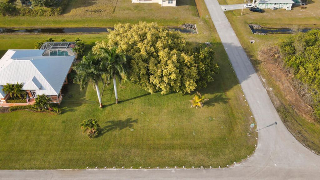 Photo of 4694 SW Athena Drive, Port Saint Lucie, FL 34953 (MLS # R10965887)