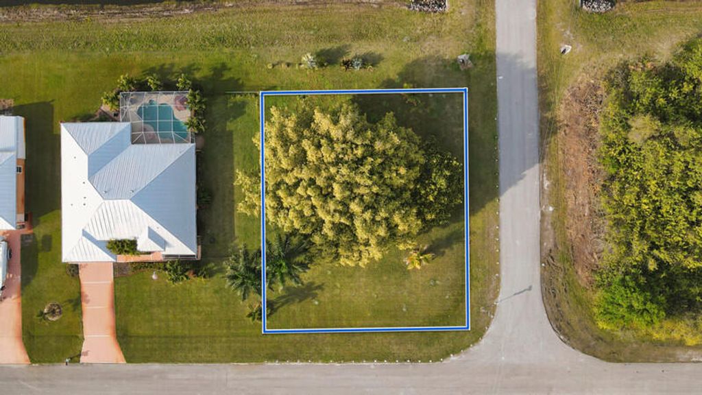 Photo of 4694 SW Athena Drive, Port Saint Lucie, FL 34953 (MLS # R10965887)