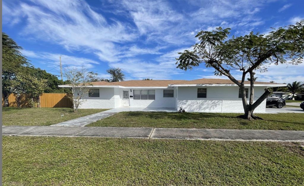 Photo of 201 4th Street, Lake Park, FL 33403 (MLS # R10773697)