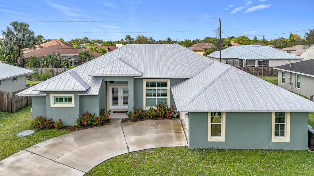 Photo of 3662 SW Vincennes Street, Port Saint Lucie, FL 34953 (MLS # R11035148)