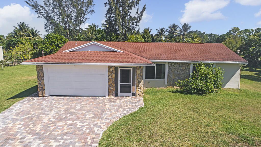 Photo of 16525 87th Lane N, Loxahatchee, FL 33470 (MLS # R10977572)