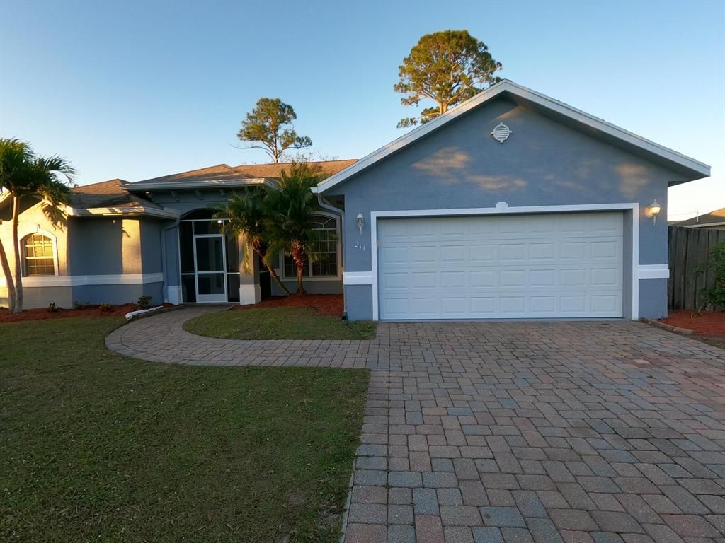 Photo of 1211 SW Wellington Avenue, Port Saint Lucie, FL 34953 (MLS # R10771007)