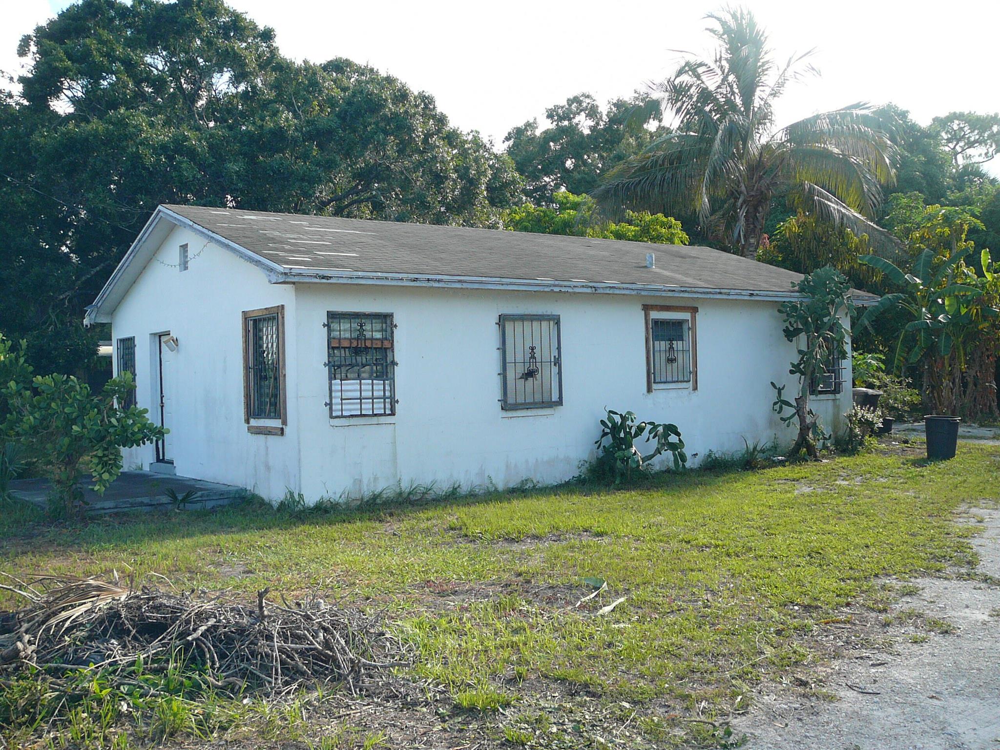 ESTATE WANTS THIS SOLID CBS HOME ON NEARLY 1/2 ACRE SOLD IMMEDIATELY AND HAS PRICED IT TO DO SO. IT IS IN NEED OF WORK, HOWEVER THE UPSIDE IS HUGE. PROPERTY IS FULLY FENCED AND HAS MATURE OAKS, PALMS AND A MANGO TREE. SITUATED DIRECTLY ACROSS FROM DREAMLAND PARK. MINUTES TO DOWNTOWN, BEACHES, SHOPPING, I-95 AND THE TURNPIKE. CASH OFFERS ONLY, PROOF OF FUNDS MANDATORY. MAXIMUM 5 DAY INSPECTION AND NO MORE THAN A 30 DAY CLOSE. SOLD IN ABSOLUTE AS IS CONDITION.