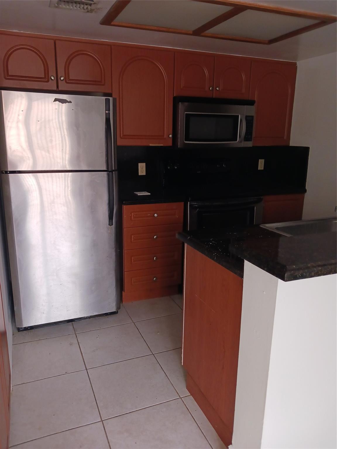 ATTENTION BUYERS AND OR INVESTORS----FOR SALE WITH TENANT-- THIS UNIT IS RENTED JULY 1ST 2024 T0 JUNE 30TH 2025- AT $1600 A MONTH -2/2 located on the second floor of a 8 unit building #24 in a DEVELOPMENT called Crescent Cove in Coral Springs It has stainless steel appliances and a modern kitchen. There is a full size washer dryer in the unit. There is a living room/ dining room combo with ceramic tiles and with access to the patio thru sliding doors. The patio has a storage closet. The unit has just been painted and new carpeting has been installed in both bedrooms. There is a clubhouse and a pool. HOUSING VOUCHERS ARE ACCEPTED from tenants