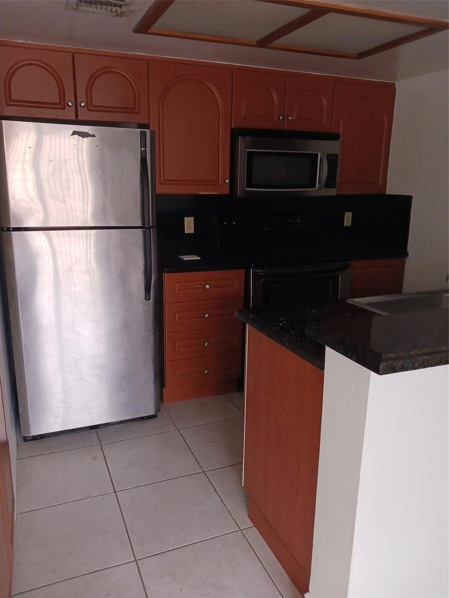 ATTENTION BUYERS AND OR INVESTORS----FOR SALE WITH TENANT-- THIS UNIT IS RENTED JULY 1ST 2024 T0 JUNE 30TH  2025- AT $1600 A MONTH -2/2 located on the second floor of a 8 unit building #24 in a DEVELOPMENT called Crescent Cove in Coral Springs It has stainless steel appliances and a modern kitchen. There is a full size washer dryer in the unit. There is a living room/ dining room combo with ceramic tiles and with access to the patio thru sliding doors. The patio has a storage closet. The unit has just been painted and new carpeting has been installed in both bedrooms.  There is a clubhouse and a pool. HOUSING VOUCHERS ARE ACCEPTED from tenants