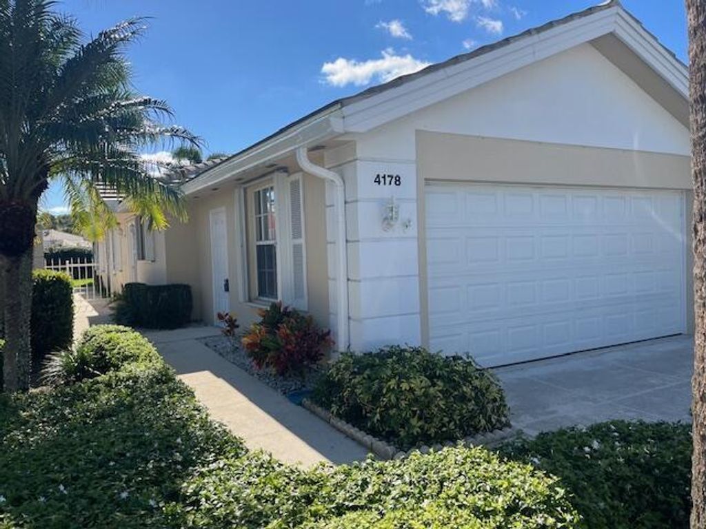 Photo of 4178 Royal Oak Drive, Palm Beach Gardens, FL 33410 (MLS # R10952636)