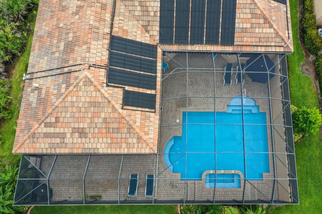 Photo of 3010 NW Crystal Lake Drive, Jensen Beach, FL 34957 (MLS # R10933332)