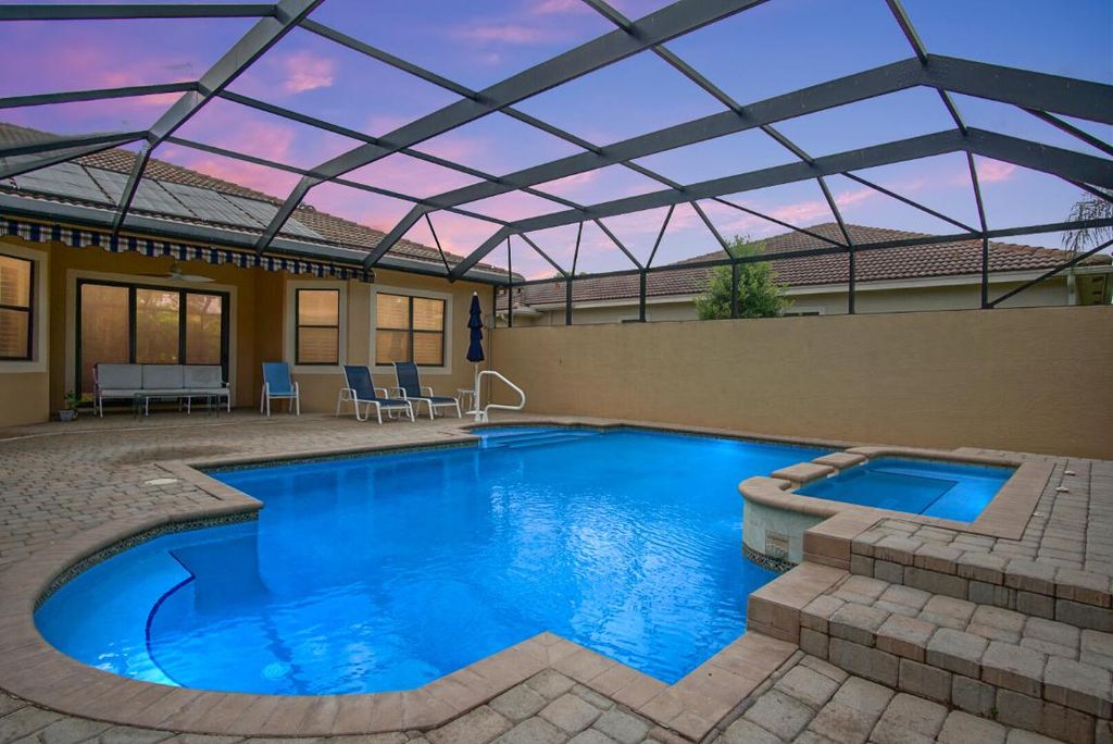 Photo of 3010 NW Crystal Lake Drive, Jensen Beach, FL 34957 (MLS # R10933332)