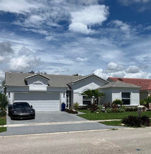 Photo of 8280 Lake Cypress Road, Lake Worth, FL 33467 (MLS # B26074692)