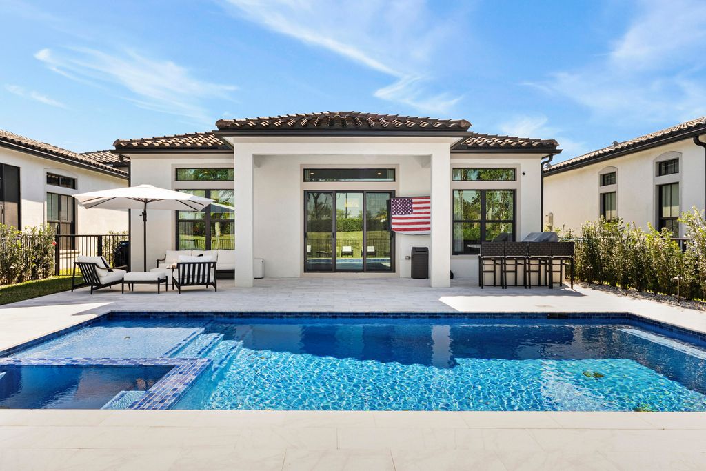 Photo of 7465 Seacoast Drive, Parkland, FL 33067 (MLS # R11161028)