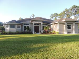 Do not miss this New 2014 model perfect home! Built with energy efficiency as one of its key features! All cabinets are wood with soft-close and granite counters. Kitchen has upgraded stainless steel appliances. Tongue and groove wood ceilings on exterior entry and back screened porch. Coffered ceilings (Level 5 smooth finish), 12 ft ceiling hts with 10 ft in bedrooms. 8 ft solid core doors. 24'' tile thru-out with handscraped wood floors in bedrooms. 7-1/2'' baseboards. All interior walls are sound proofed. Icynene insulation (makes your attic space conditioned for storing items and lowers your energy bill. IMPACT WINDOWS. Security system with full surveilance. Home has speakers and is wired for sound system. Fully sodded and irrigated yard with beautiful landscape and hedges on 3 sides.