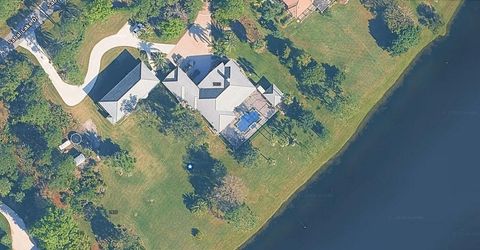 Photo of 7833 Sabal Lake Drive, Port Saint Lucie, FL 34986 (MLS # R11160696)