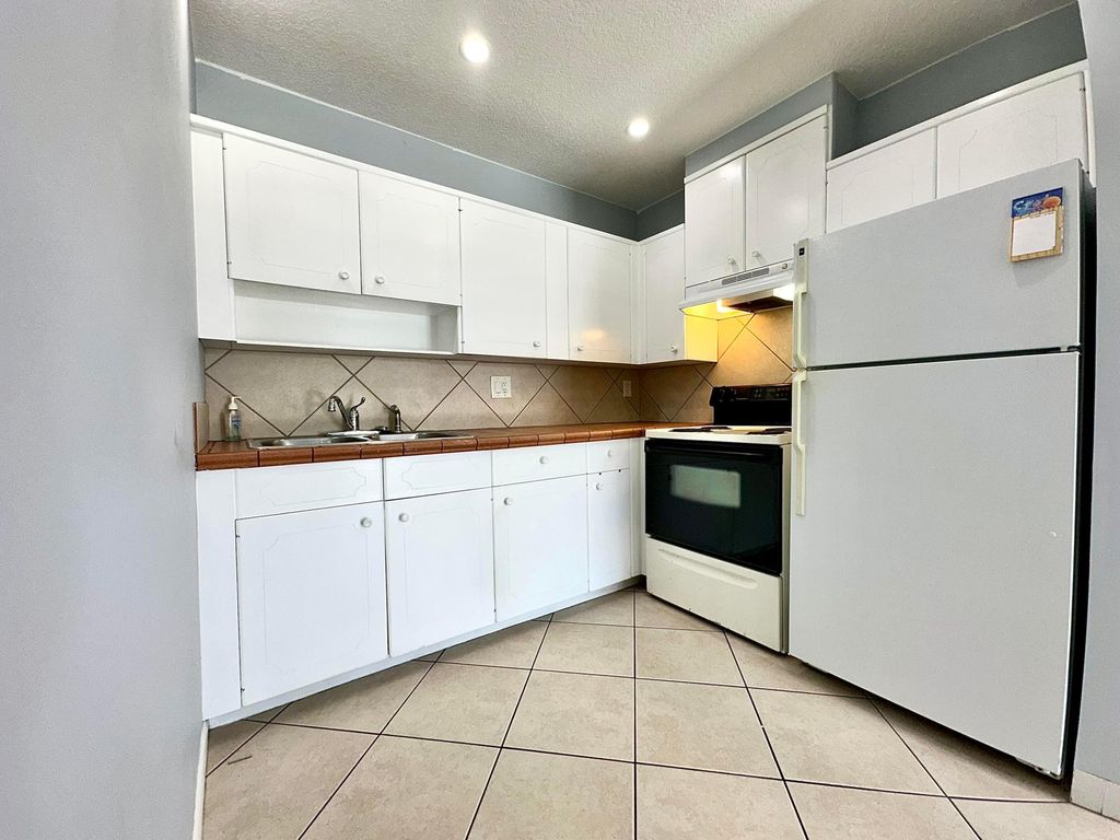 Photo of 1261 SE 4th Street #2, Deerfield Beach, FL 33441 (MLS # B26026622)