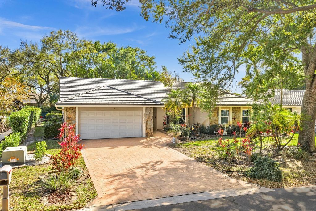 Photo of 9080 NW 50th Court, Coral Springs, FL 33067 (MLS # F10555011)