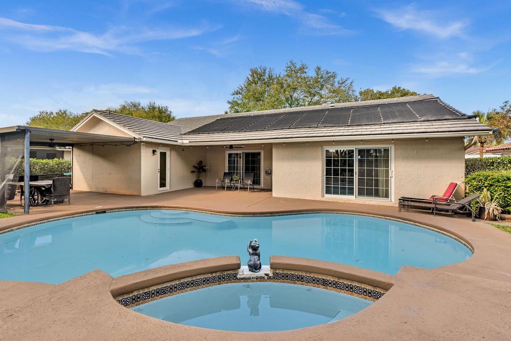Photo of 9080 NW 50th Court, Coral Springs, FL 33067 (MLS # F10555011)