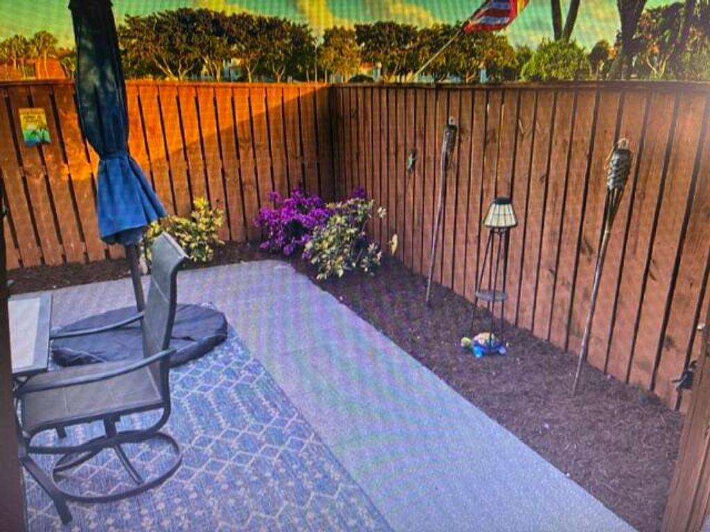 Photo of 107 Buttonwood Lane #107, Boynton Beach, FL 33436 (MLS # B26016531)