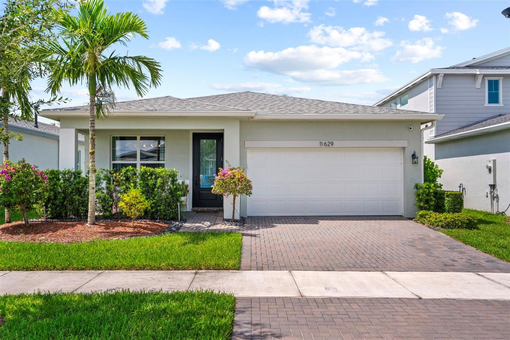 Photo of 11629 SW Lyra Drive, Port Saint Lucie, FL 34987 (MLS # F10510972)