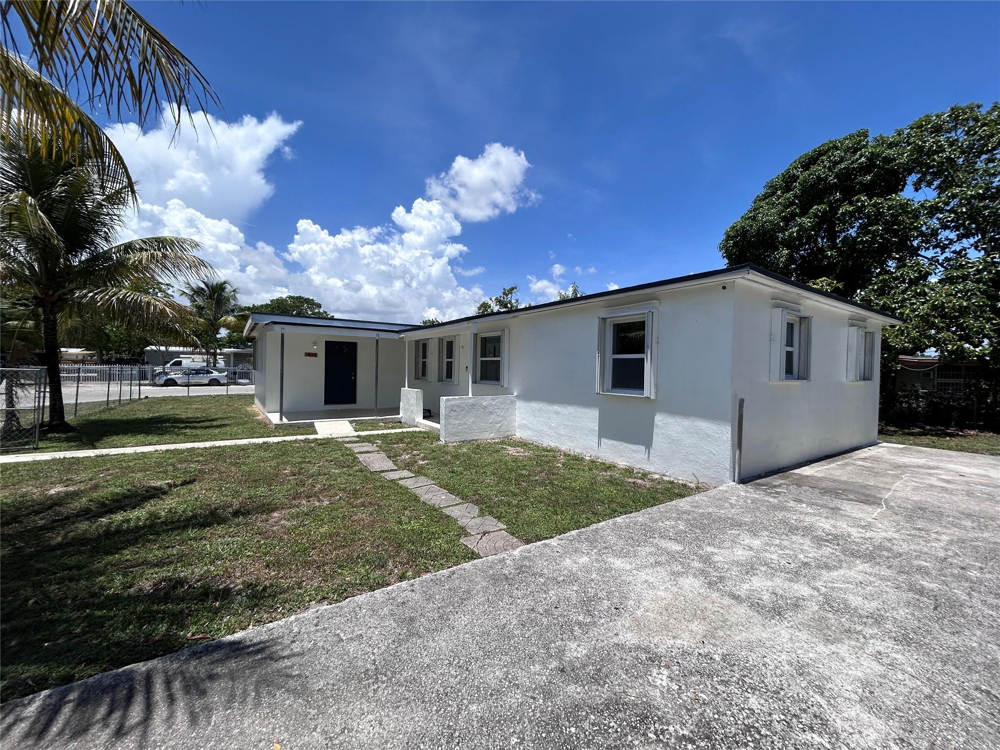 Fully Remodeled 4-Bed, 3-Bath Miami Gem! This stunning corner-lot home sits on a large yard and has been completely renovated inside and out, featuring a brand-new roof, AC, water heater, and elegant flooring throughout. Enjoy a kitchen with modern finishes and new appliances, luxuriously updated bathrooms, and a dedicated laundry room for added convenience. With 4 spacious bedrooms and 3 full baths, there’s plenty of space for family and guests. The oversized yard provides room to relax, entertain, or even expand. Located just 20 minutes from Hard Rock Stadium, 25 minutes from beaches, and close to major highways, airports, shopping, and dining—all in the heart of Miami. Move-in ready and waiting for you! No HOA.