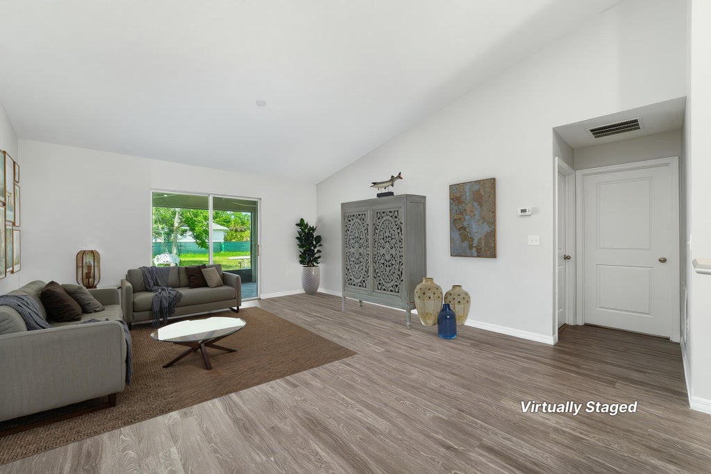 Photo of 4589 SW Van Dyke Street, Port Saint Lucie, FL 34953 (MLS # R11101328)