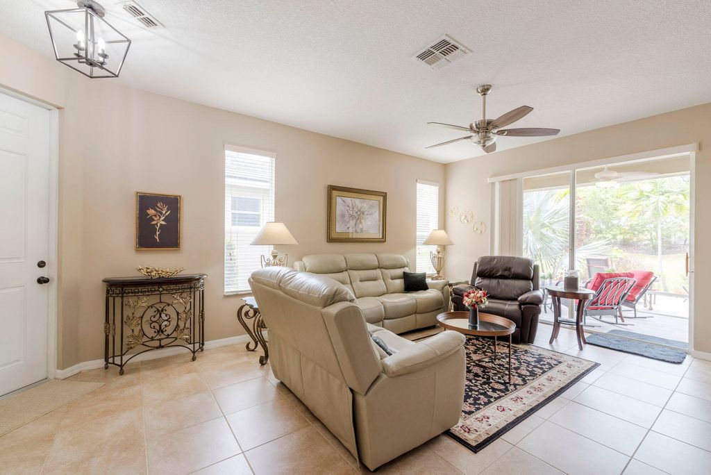 Photo of 9570 SW Flowermound Circle, Port Saint Lucie, FL 34987 (MLS # R11073537)