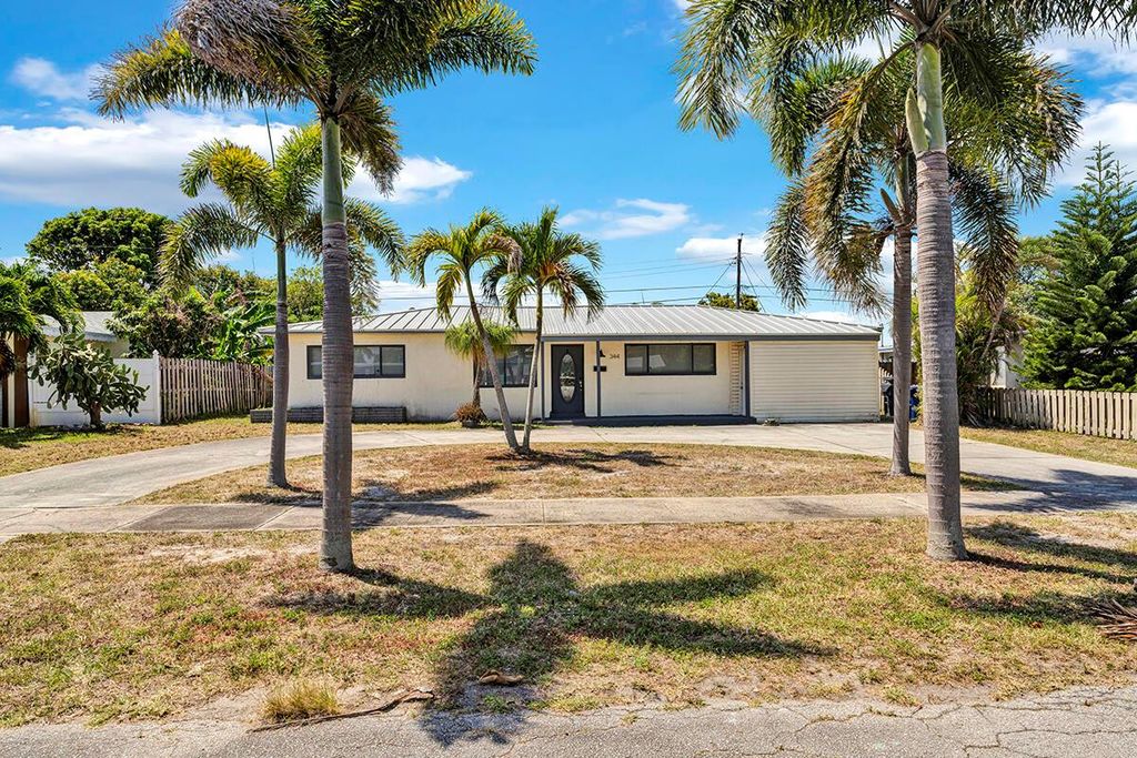 Photo of 344 E Jasmine Drive, Lake Park, FL 33403 (MLS # R11086063)