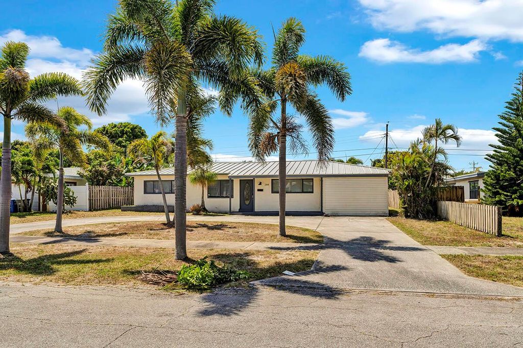 Photo of 344 E Jasmine Drive, Lake Park, FL 33403 (MLS # R11086063)