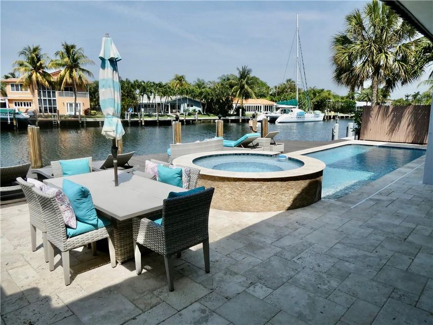 BOATERS PARADISE!!GORGEOUS WATERFRONT BEACH HOME IN THE DESIRABLE AREA OF THE LANDINGS.80FT DEEP WATER WIDE CANAL PRIVATE DOCK,OCEAN ACCESS. UNIQUELY DESIGNED 4/4 WITH VAULTED CEILINGS,SPACIOUS 3 CAR GARAGE. ALL IMPACT WINDOWS & DOORS LEAD OUT TO PANORAMIC WATER VIEWS. STUNNING POOL AND SPA AREA. LARGE FAMILY ROOM WITH FRENCH DOORS, FORMAL LIVING AND DINING ROOM WITH BUILT-INS. 2 MASTER SUITES,FIREPLACE.THIS HOME HAS INCREDIBLE STREET APPEAL FENCED IN WITH IRON GATES SECURING THE FRONT ENTRANCE.