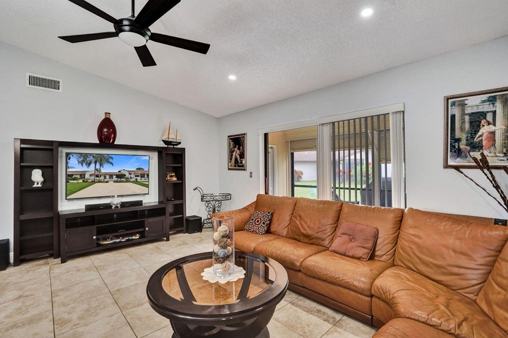 Photo of 6120 FAIRFIELD Circle, Greenacres, FL 33463 (MLS # B26091974)