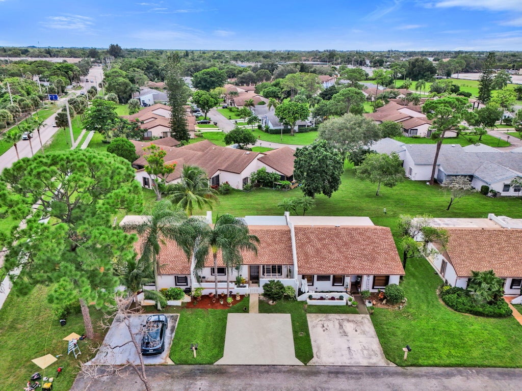 Photo of 6120 FAIRFIELD Circle, Greenacres, FL 33463 (MLS # B26091974)