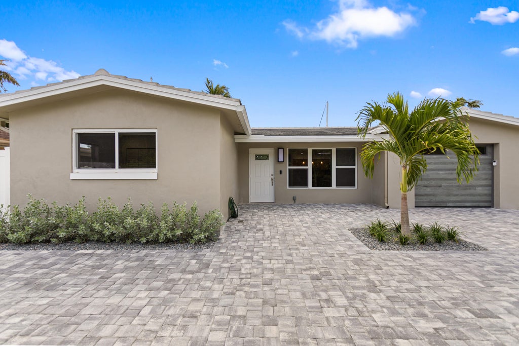 Photo of 317 NE 3RD Avenue, Dania Beach, FL 33004 (MLS # B26057388)