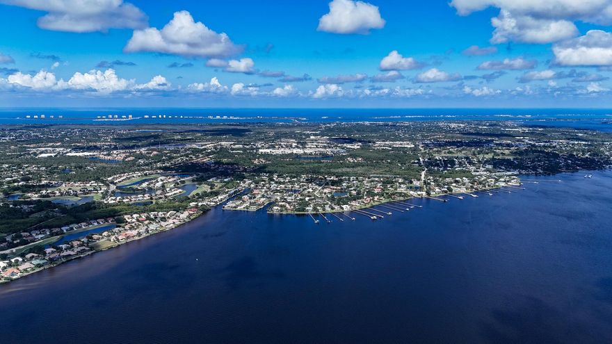 A must-see, custom design luxury home. Amazing sunsets, private swimming pool, approximately 165 feet of prime waterfront, 80-foot protected dock & boat lift. A perfect fit for large and multiple boats, paddle boards or kayaks. RV or EV parking with dedicated 50 amp service. Master suite with private balcony and wide water views, spacious walk-in closet, spa-like bath and coffee bar/loft. Open kitchen, counter seating and casual dining. Two additional guest bedrooms, possible fourth bedroom, office/den, or flex room. Oversized two-car garage.  Exceptional fishing. Private. Quiet location in cul-de-sac. A great market opportunity for boaters and anyone who enjoys a wide open view. Priced to sell now!  All reasonable offers will be considered. Call today for a private showing.