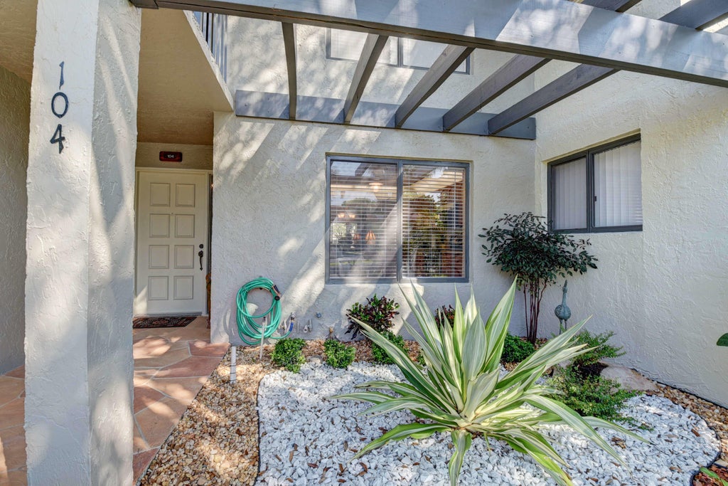 Photo of 5673 Fairway Park Drive #104, Boynton Beach, FL 33437 (MLS # R10998706)