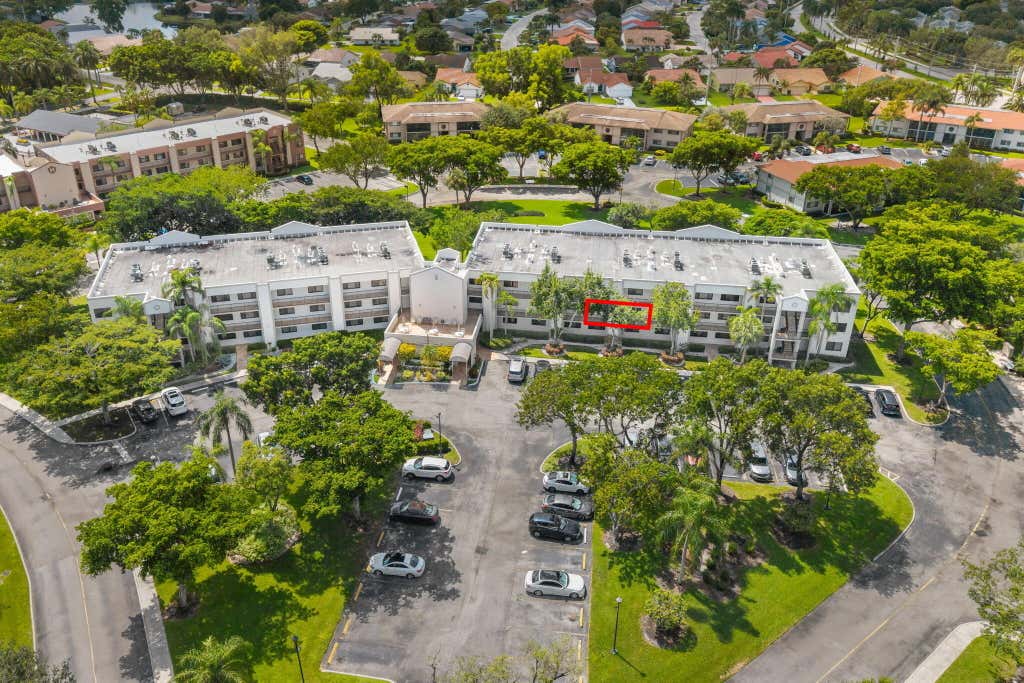 Photo of 10837 W CLAIRMONT Circle #208, Tamarac, FL 33321 (MLS # B26065553)