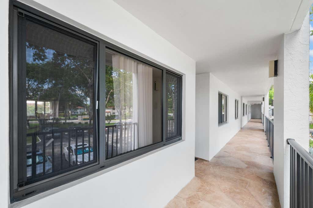 Photo of 10837 W CLAIRMONT Circle #208, Tamarac, FL 33321 (MLS # B26065553)