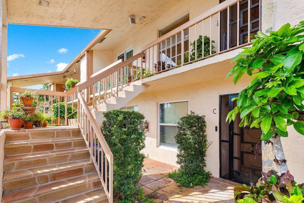 Photo of 5770 Princess Palm Court #F, Delray Beach, FL 33484 (MLS # R10941366)