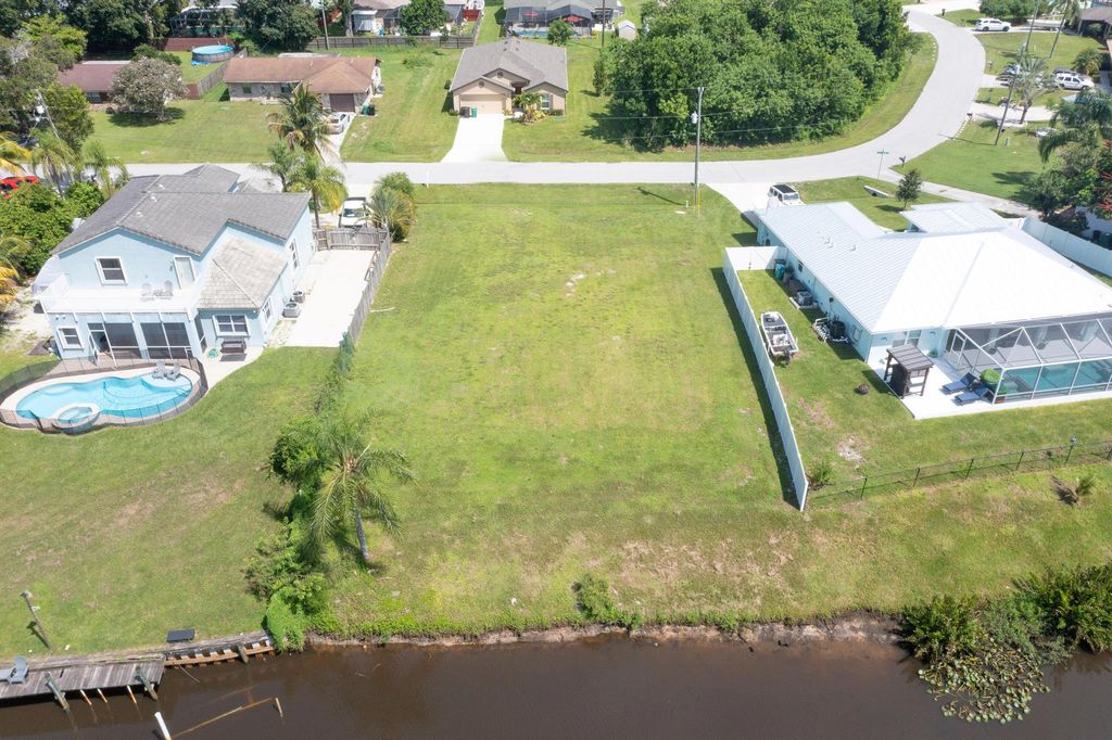 Photo of 178 NE Dominican Ter, Port St Lucie, FL 34983 (MLS # R10910215)
