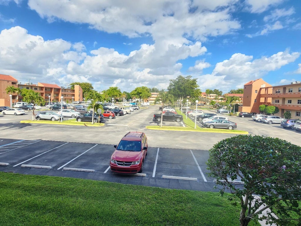 Photo of 8842 W MCNAB Road #205, Tamarac, FL 33321 (MLS # B26083807)