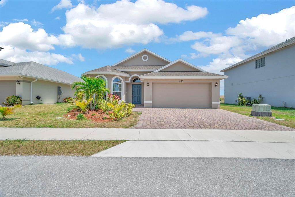Photo of 408 SEAFOAM Circle, Fort Pierce, FL 34945 (MLS # B26067430)